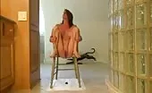 Sweet girl shitting from wooden chair