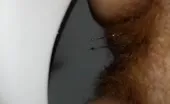 Hairy babe shitting over toilet