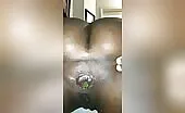 Shaved ebony girl shitting