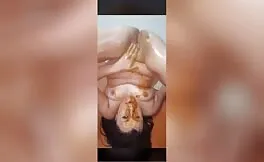 Fisting her shaved pussy hard