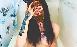Smearing shit on sexy face
