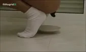Dark haired babe shits a lot in public toilet