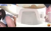 Japanese teen using public toilet