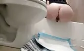 Curvy babe shits big turd