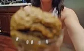 Dark haired teen smears poop
