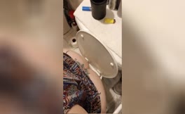 BBW babe shits over toilet