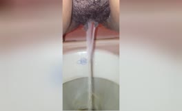 Hairy babe peeing and pooping