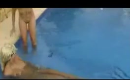Two blonde girls poop in pool